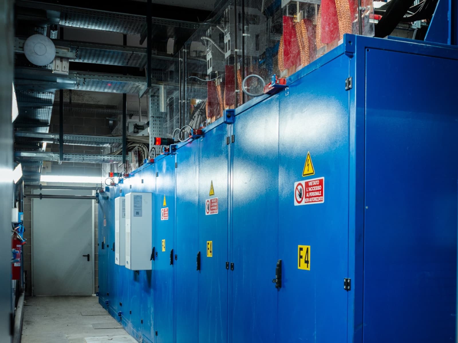Row of CIME IGBT converter cabinets in the foundry electrical room