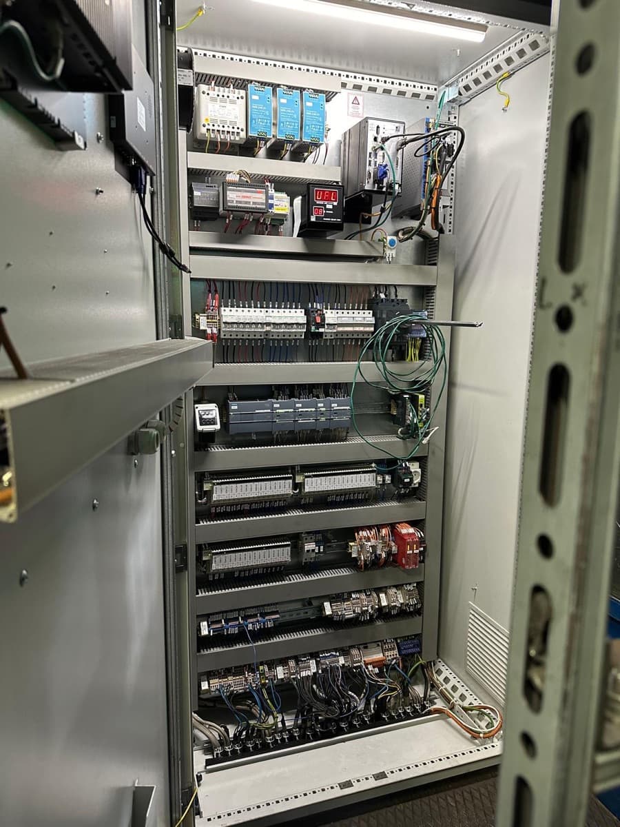After retrofit: the rebuilt grey converter cabinet for the same Pilenga Baldassarre furnace, with neatly mounted modern modules